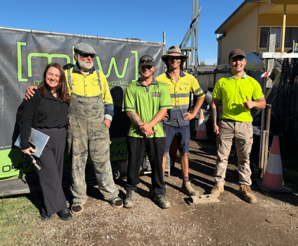 Amanda Lennon and Master Building Works Robert Dunstan and CCGT apprentices